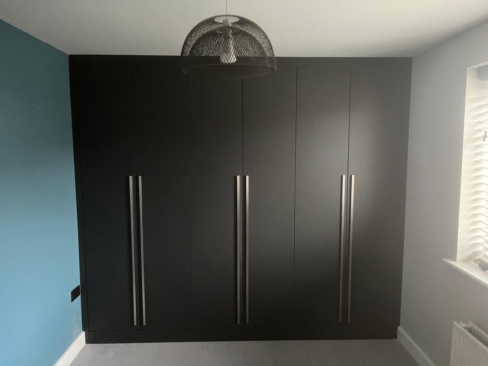 Bespoke alcove cabinets and shelving installed by Bespoke Furniture Group in a Newcastle home