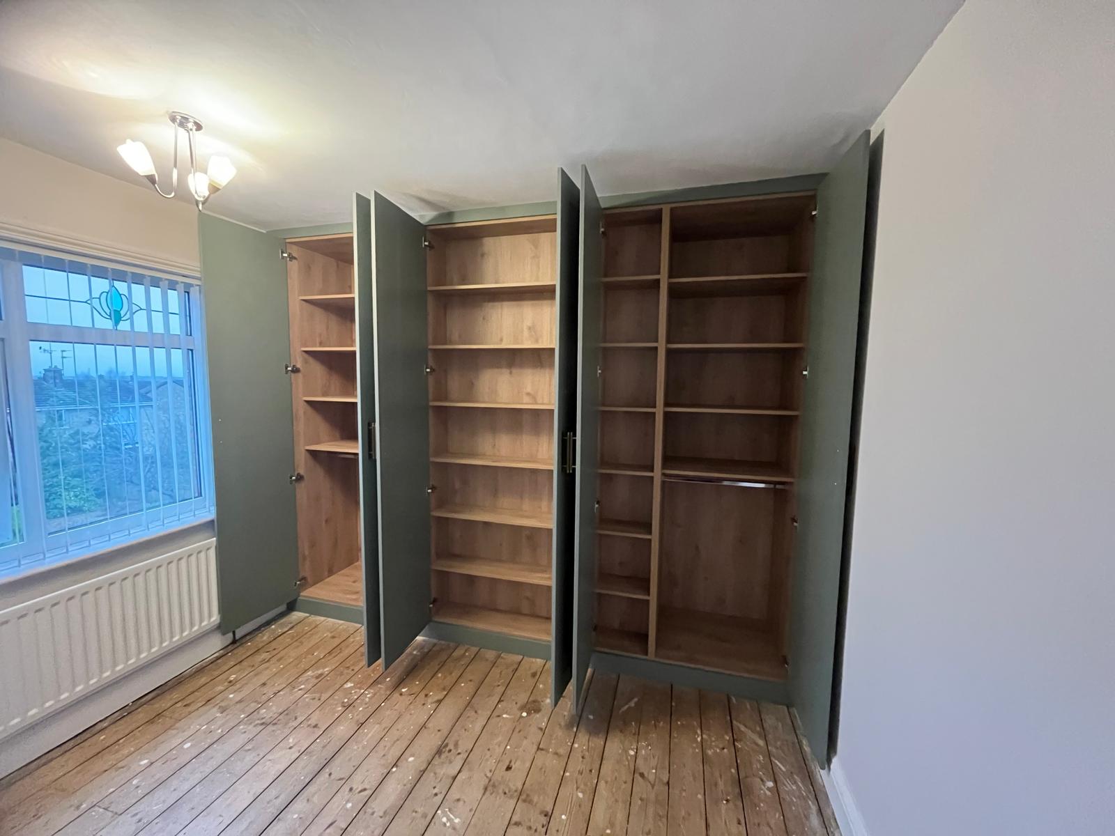 Bespoke alcove cabinets and shelving installed by Bespoke Furniture Group in a Newcastle home